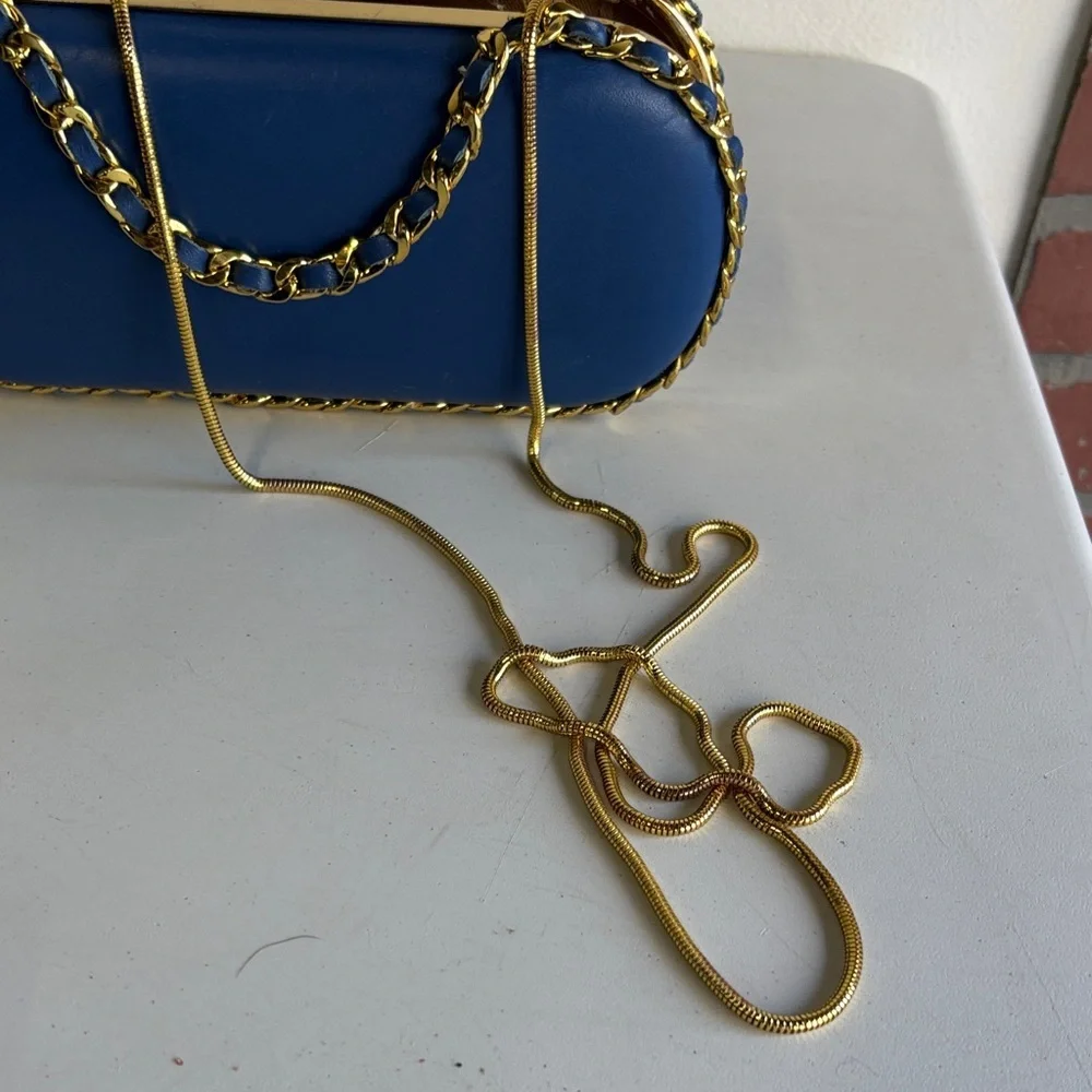Chic Blue Pill Clutch with Gold Chain Accent